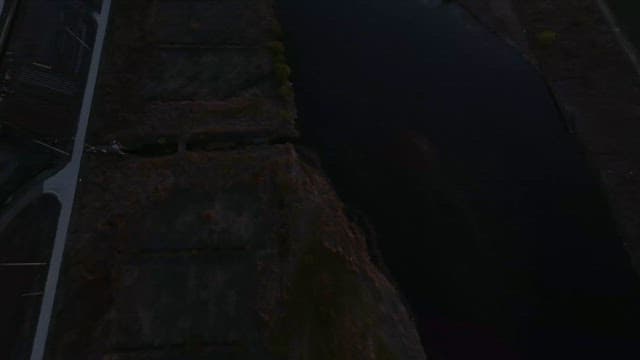 Misty River Illuminated by the Rising Sun