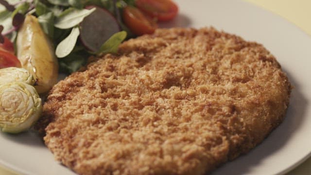 Pork Cutlet Served with Fresh Salad