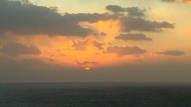 Golden Sunset Over the Ocean Horizon