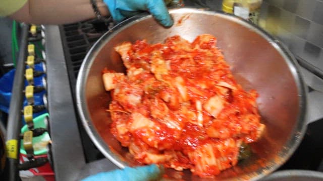Preparing Spicy Korean Kimchi Dish