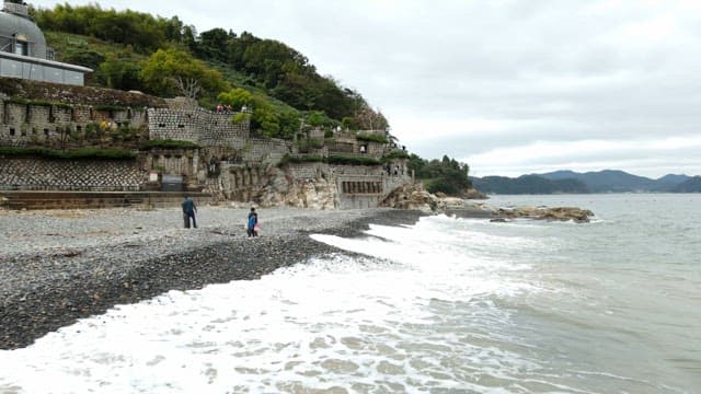 Coastal stone structure with waves
