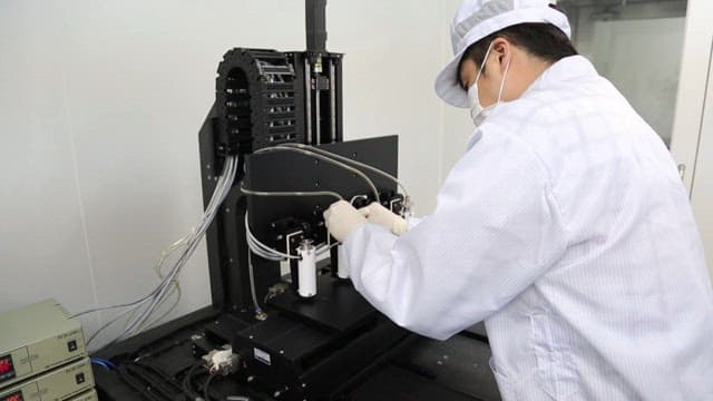 3D printing machine in operation in the lab