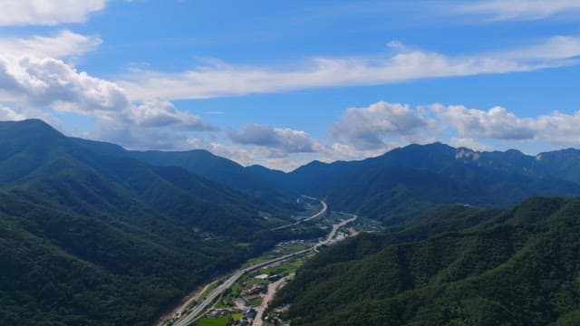 Vast mountain landscape under a blue sky