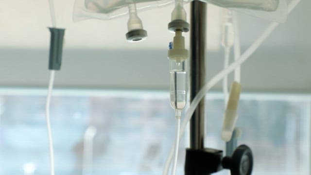 IV drip in a sunlit hospital room