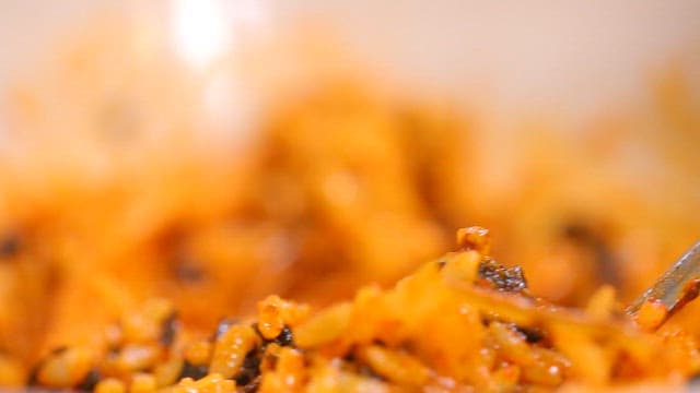 Spoonful of appetizing and spicy fried rice