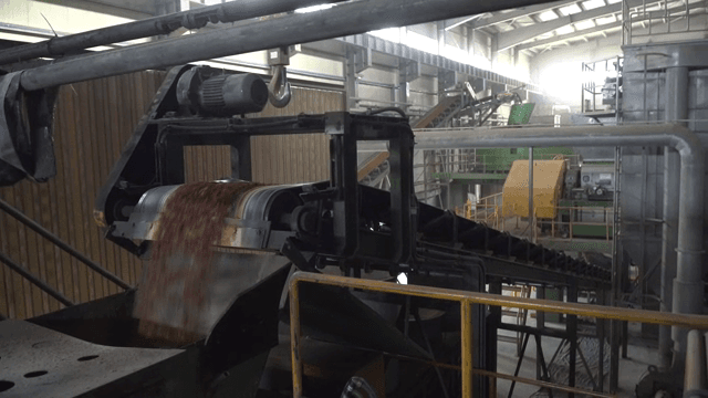 Conveyor belt in a factory processing materials