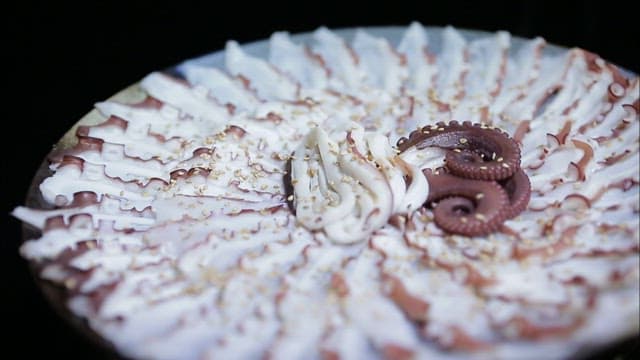 Octopus parboiled neatly plated on a plate