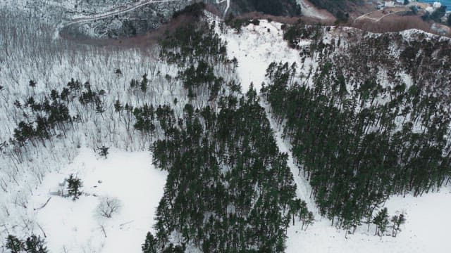 Snowy Landscape of Mountains Near the Coast