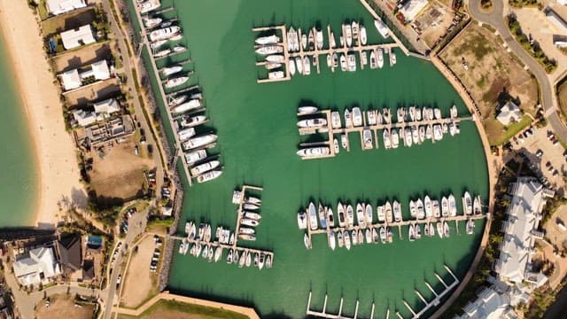 Aerial view of a marina with yachts