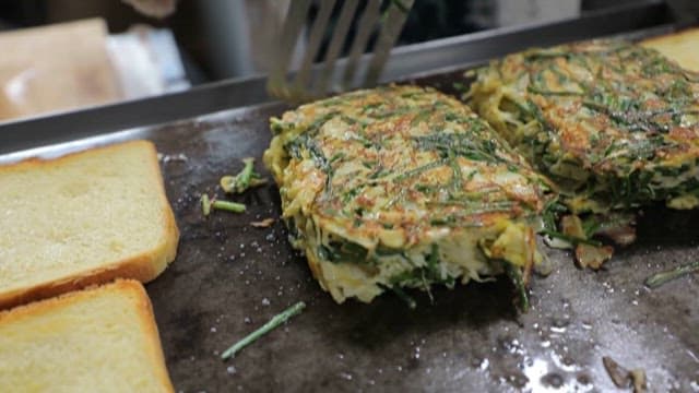 Cooking Savory Toast with Pancakes on a Hot Griddle