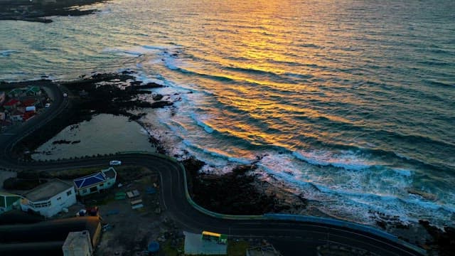 Coastal Sunset with Golden Ocean Reflections