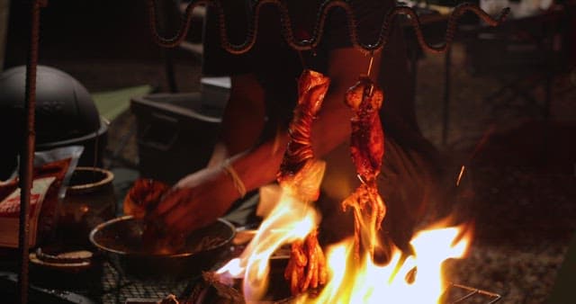 Sizzling squid being cooked on a grill