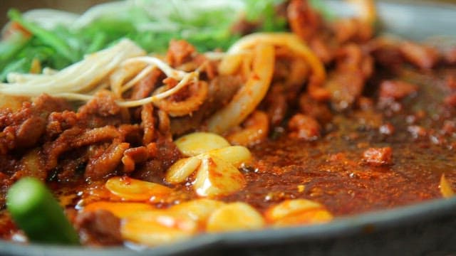 Bean sprouts added to spicy duck bulgogi