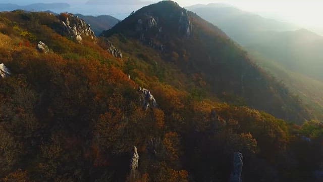 Beautiful Scenery of an Autumn Mountain with Sunrise