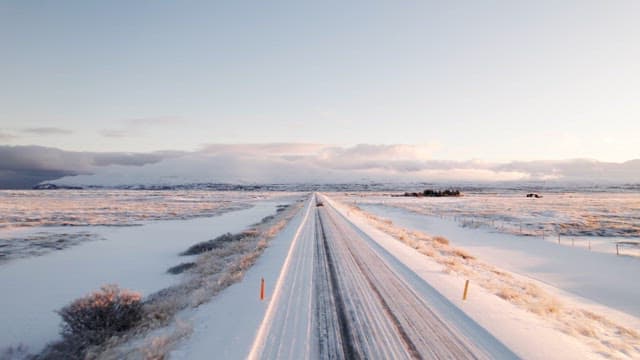 Car driving on a snowy road