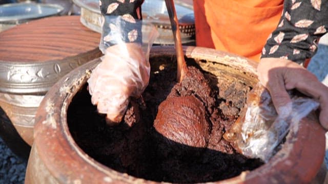 Aged soybean paste taken out of a crock pot