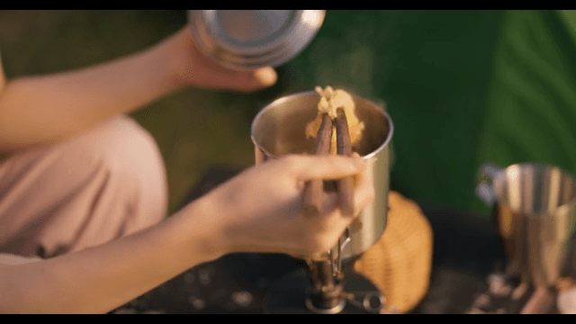 Person Making Ramen for a Camping Night Snack