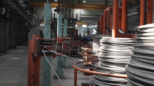 Coiled steel wires in a factory setting
