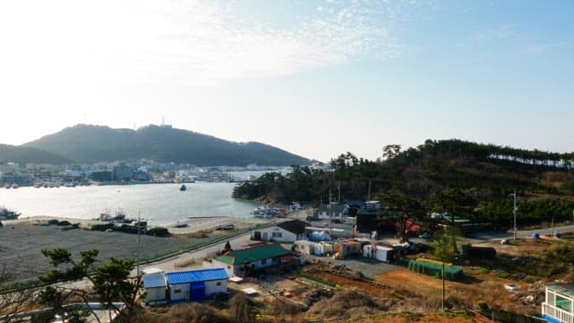 Village surrounded by the sea and hills
