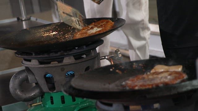 Cooking pancakes on a hot oiled pan