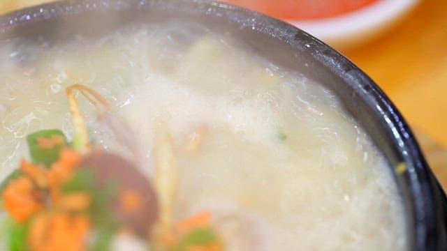Ginseng chicken soup boiling in a hot pot