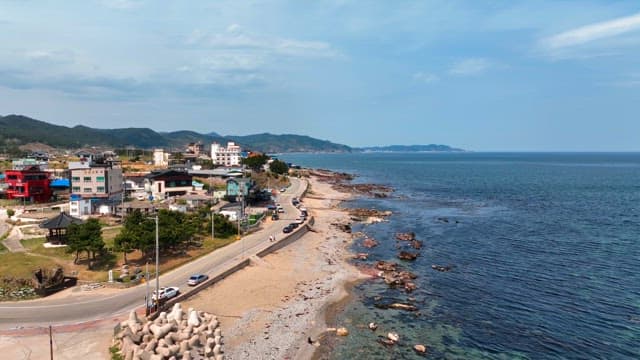 Coastal road with buildings and sea view
