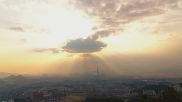 Sunset over a sprawling cityscape