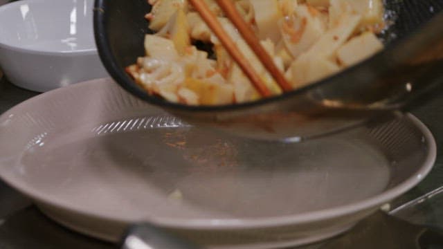 Freshly cooked stir-fried bamboo shoots on a plate