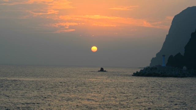 Serene Sunset Over Calm Seaside