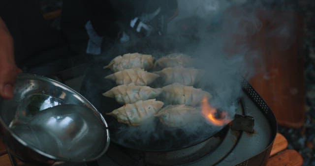 Cooking Dumplings on a Portable Stove