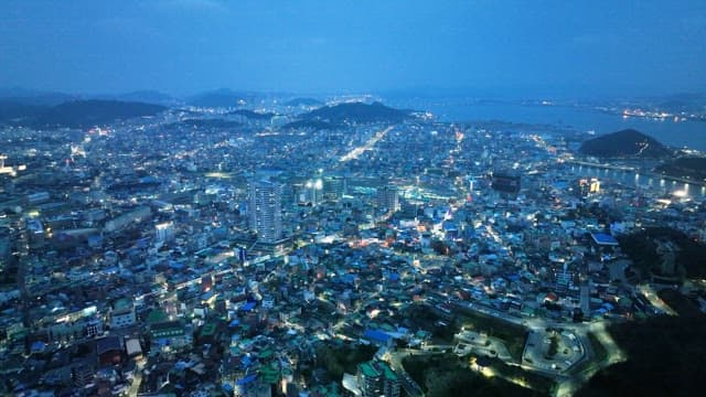 Vibrant cityscape at dusk with lights