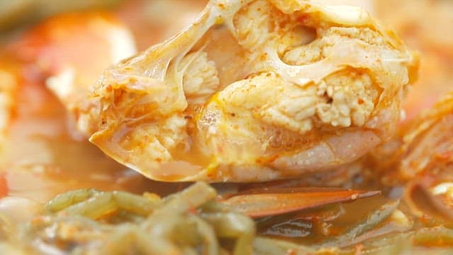 Deliciously boiling crab soup with sweet potato stem