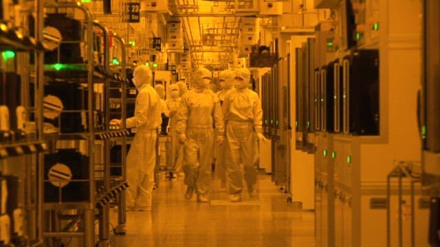 Technicians Working Inside a Semiconductors Plant