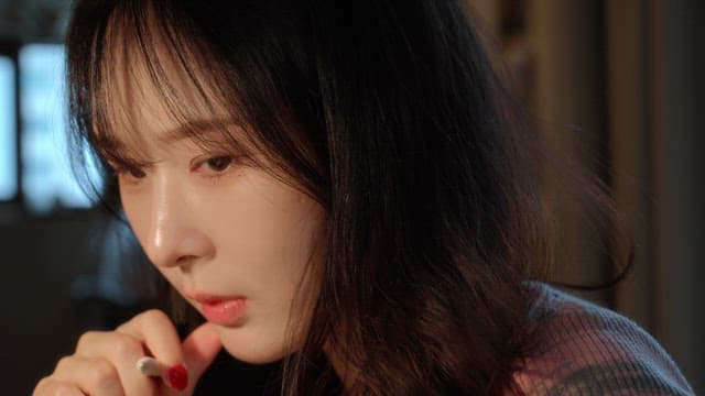 Woman concentrating indoors