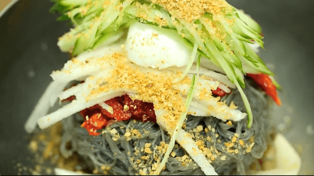 Cold buckwheat noodles with raw pollack with vegetables