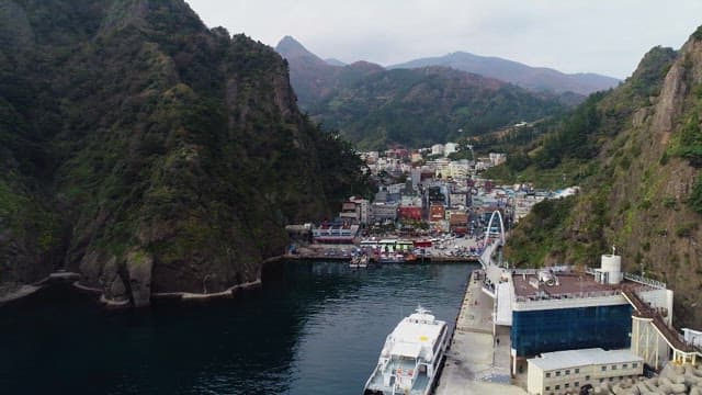 Coastal Town Nestled in Mountainous Terrain