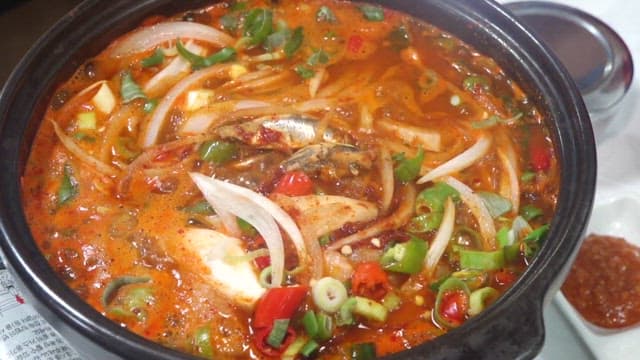 Spicy Fish Stew with Onion and Red Pepper