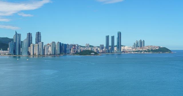 Clear day, coastal city Busan and calm sea scenery