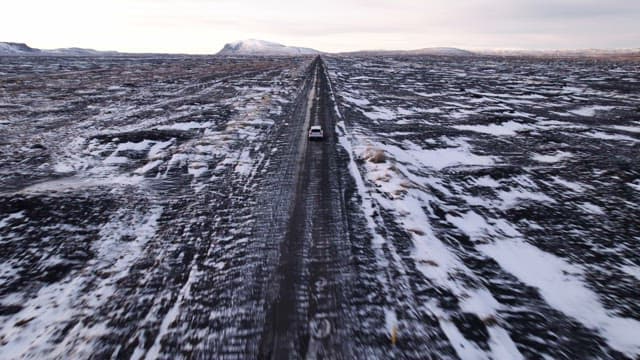 Car driving on a snowy road