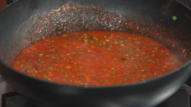 Spicy Sauce Simmering on a Pan