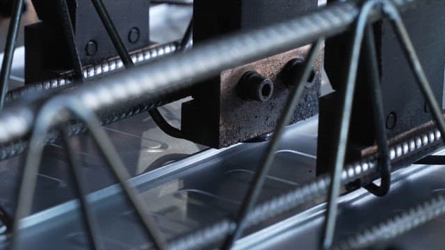 Metal being processed with sparks flying