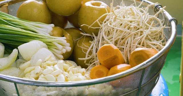 Fresh Vegetables and Fruits in a Colander