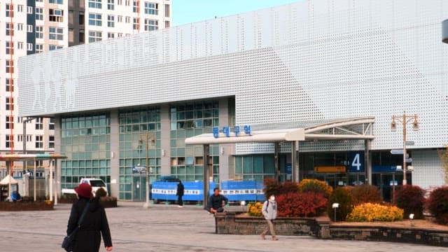 Passengers walking outside Dongdaegu Station