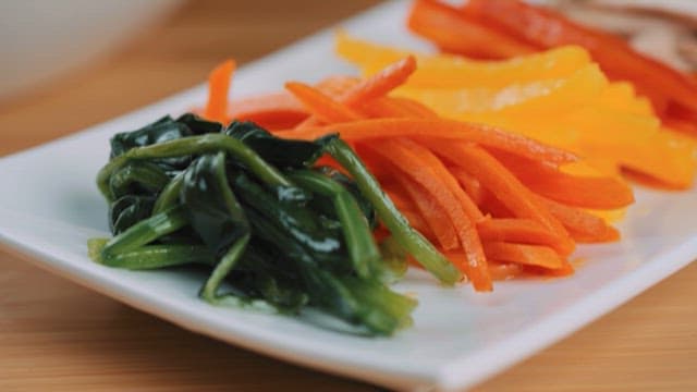Sliced ​​Fresh Vegetables and Grilled Meat on a White Plate