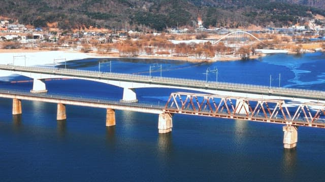 Wintertime Aerial View of Bridges Over River