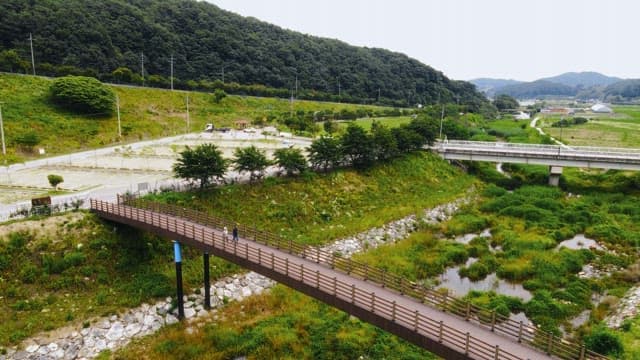 Scenic bridge in green and agricultural fields