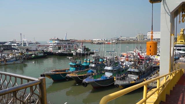 Coastal Industrial Harbor With Moored Ships