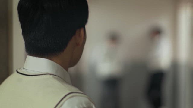 Student Avoiding Friends in the School Hallway