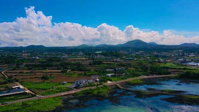 Tranquil Coastal Farmlands by Clear Blue Waters