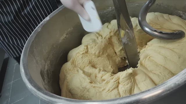 Kneading dough using a large industrial mixer